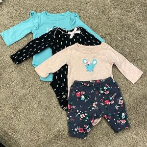 Newborn lot - 3 long sleeve onesies and one pair of pants